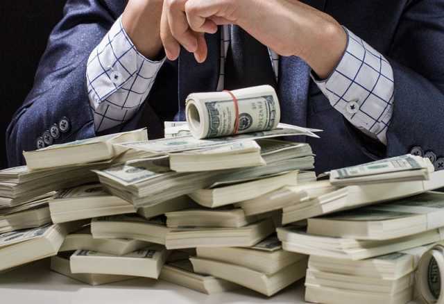 هكذا حوّلت الميليشيات العراقية بطاقات الائتمان إلى قناة لتهريب الدولار