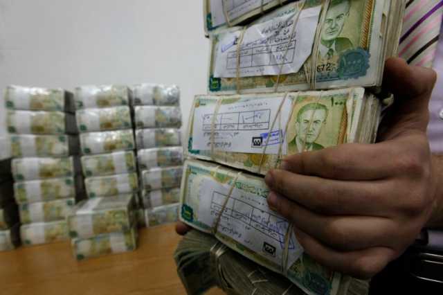 تراجع طفيف في سعر صرف الليرة السورية مقابل الدولار اليوم الأربعاء