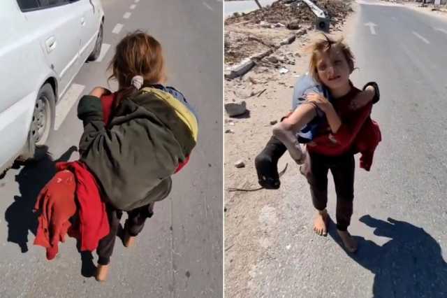شاهد.. طفلة نازحة من غزة تحمل شقيقتها الجريحة