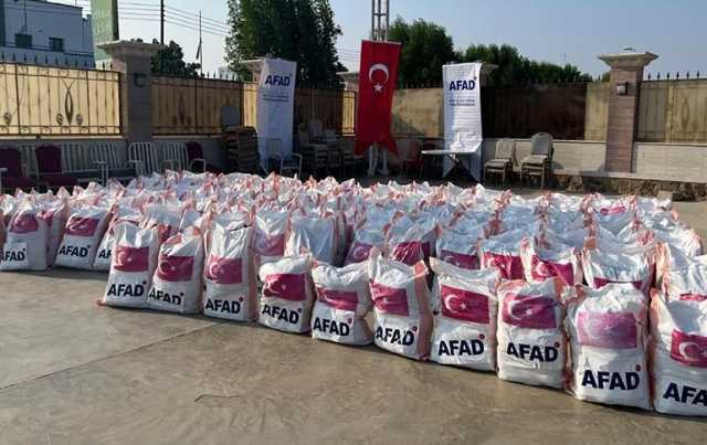 أفاد التركية تقدم مساعدات غذائية لأسر نازحة بالسودان