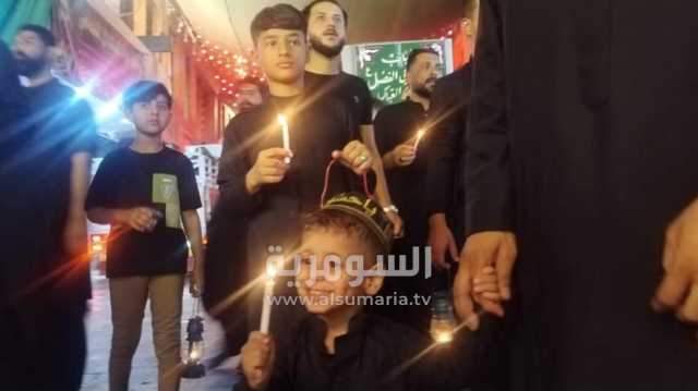 في النجف.. شموع ومسيرات في ليلة الوحشة
