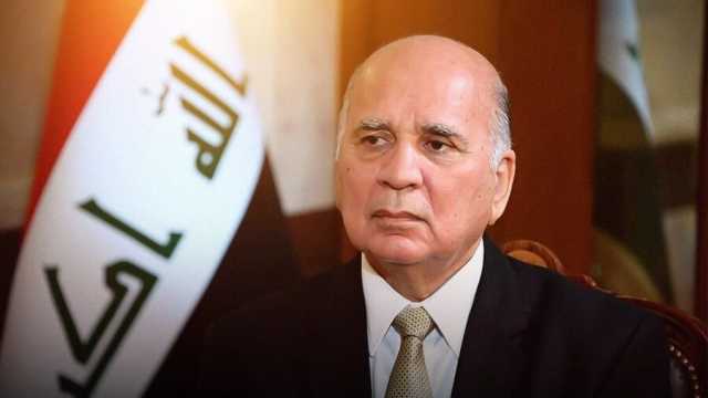 وزير الخارجية: العراق يسعى لإقناع الفصائل المسلحة بإلقاء السلاح