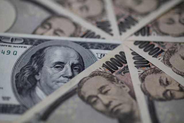 الدولار مستقر والين يلامس أعلى مستوى خلال أسبوعين