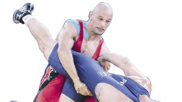 قصة أسطورة كرم جابر.. المصارع البطل الذي أعاد عزف السلام الوطني بعد غياب 56 عاما