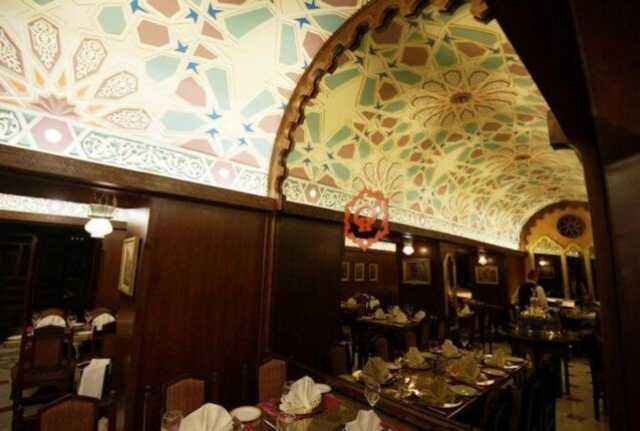 بعد زيارة السيسي وماكرون.. ماذا تعرف عن مقهى نجيب محفوظ؟