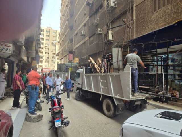 رفع ٣٠٠ حالة إشغال وتعديات من المحال والمنشآت التجارية بالجيزة
