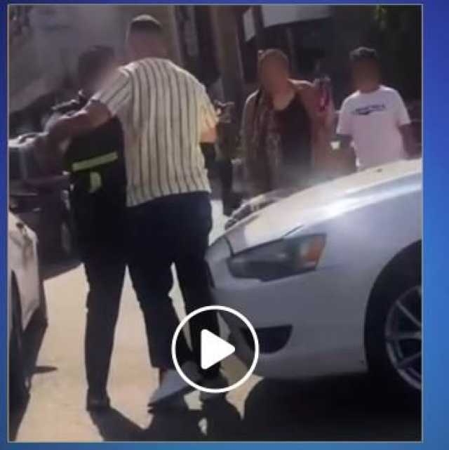ضبط المتهم بالتعدي على رجل مرور في الشارع بالجيزة