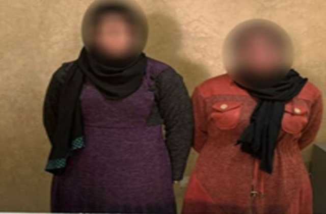 ضبط سيدتين جمعتا البطاقات الشخصية لناخبين بمحيط لجنة بالهرم