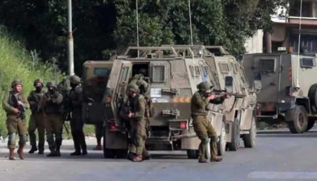 قوات العدو تعتقل 23 فلسطينيا من الضفة الغربية