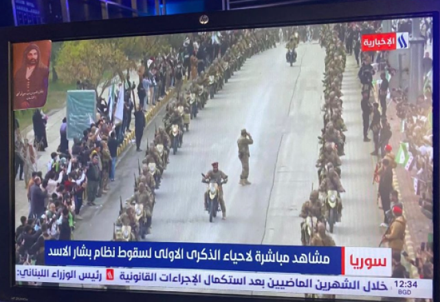 الإعلام الرسمي يروّج لأعدائه: جيش “جايينك على كربلاء” يستعرض على شاشة العراقية