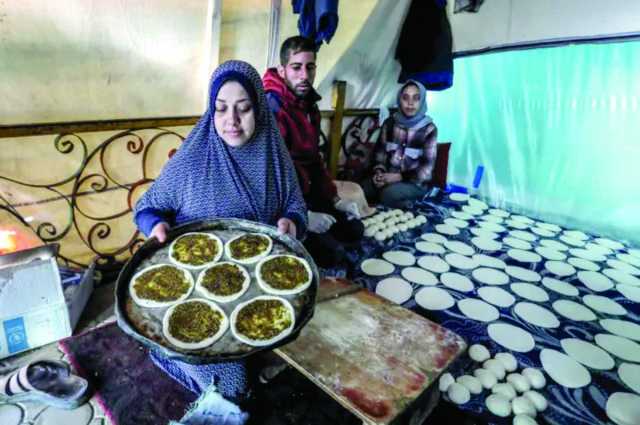 «خيمة مناقيش الزعتر» مصدر رزق في الحرب على غزة