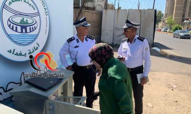 نصب وصيانة عدد من الإشارات الضوئية في شوارع بغداد