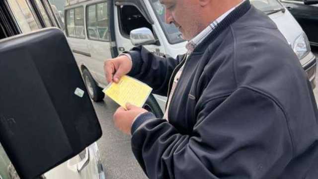فض 3 مواقف عشوائية وضبط 300 مخالفة للسيارات بالجيزة