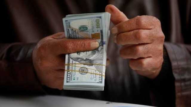لتعزيز العملة المحلية..العراق يفرض حظرًا على السحب النقدي بالدولار