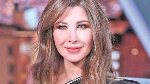 نانسي عجرم بإطلالة أنيقة من كواليس حفلها في أبو ظبي.. صور