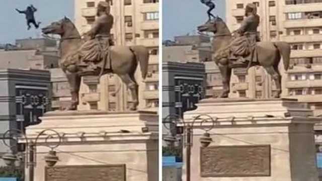 شاب سوداني يحاول الانتحار ويفزع المارة في مصر.. فيديو