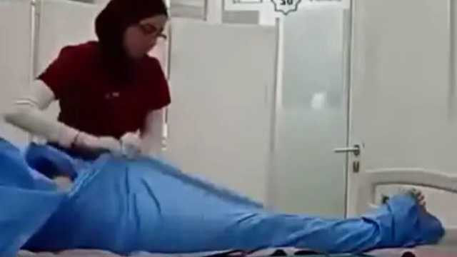 إيقاف ممرضة صورت متوفى أثناء تجهيزه قبل تسليمه لعائلته