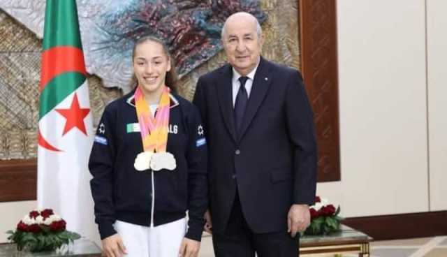 بالصور.. رئيس الجمهورية عبد المجيد تبون يستقبل البطلة كيليا نمور