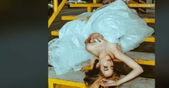 اكتشفت خيانة العريس.. عروس مكسيكية تحضر جلسة تصوير بمفردها على كوبرى مشاه المرأة والمنوعات