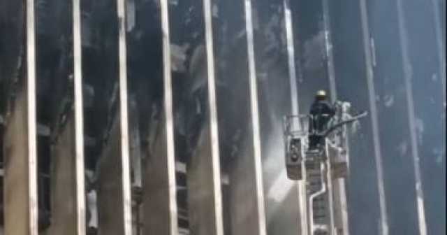 المعمل الجنائى يعاين موقع حريق سنترال رمسيس
