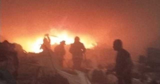 السيطرة على حريق داخل مخزن خرده فى بولاق أبو العلا.. صور