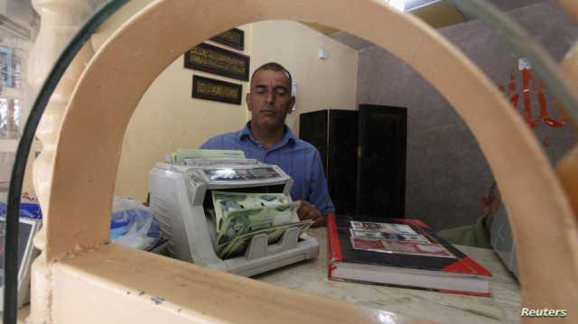 العراق يعلن إنهاء كافة عمليات السحب النقدي بالدولار في أول يناير 2024