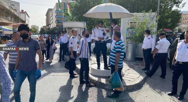 اعتداء على ضابط برتبة لواء مرور في منطقة الكرادة ببغداد (فيديو)