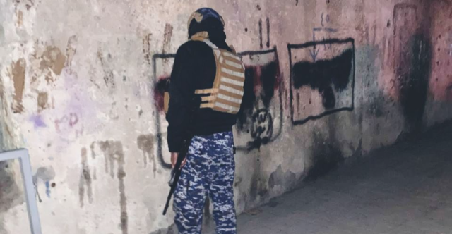 الأمن العراقي يعتقل المتهم برسم راية داعش في بغداد