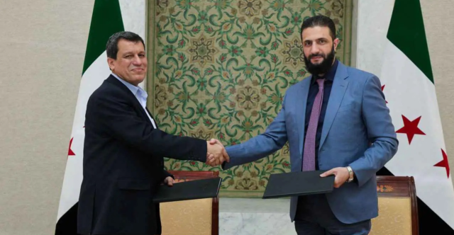 وول ستريت تكشف عن وسيط كان عراب اتفاق الشرع وعبدي التاريخي