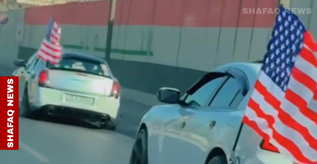 الشرطة العراقية تلاحق عجلتين تحملان العلم الأمريكي