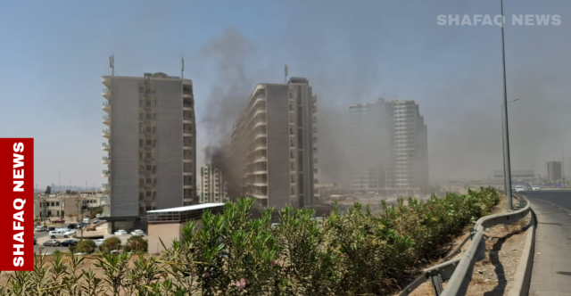 النيران تتصاعد من مجمع سكني في أربيل (صور وفيديو)