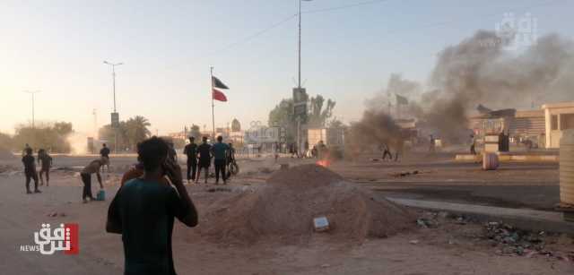 النجف.. كرّ وفرّ بين متظاهرين وقوات الأمن بسبب الكهرباء (صور)