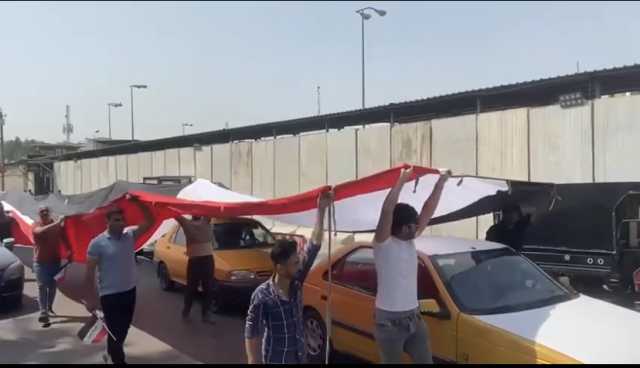 تظاهرة أمام وزارة التعليم ببغداد للمطالبة بتوسعة مقاعد الدراسات العليا.. صور