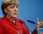 ميركل: لا أتراجع عن قراراتي