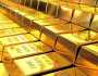 الذهب يتخلى عن ذروة قياسية